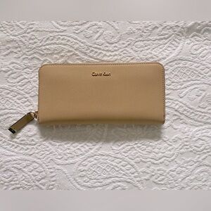 Tan wallet with many CC slots